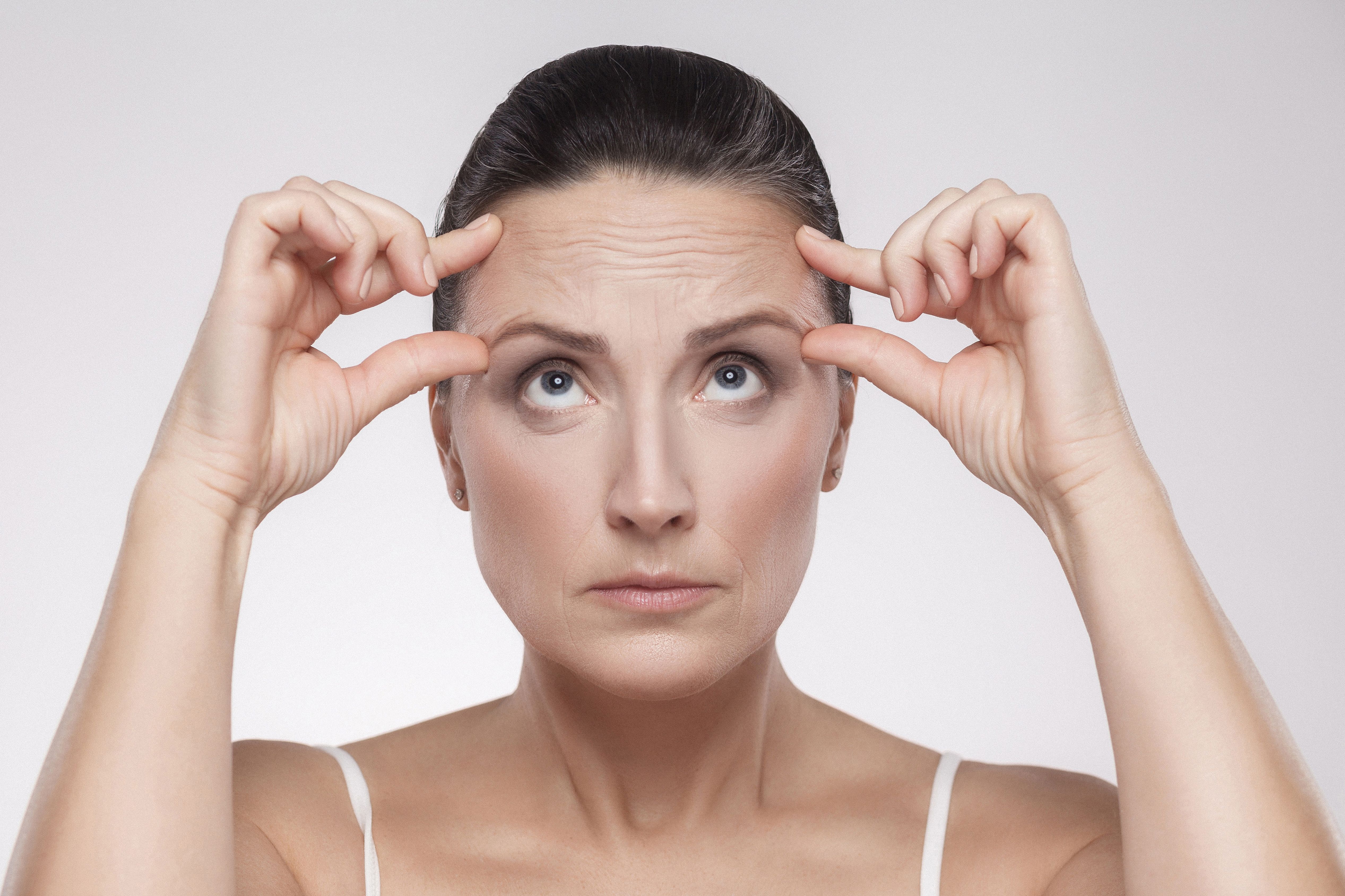 foreheadlift: plasticsurgeon:reviews:foreheadreduction.jpg